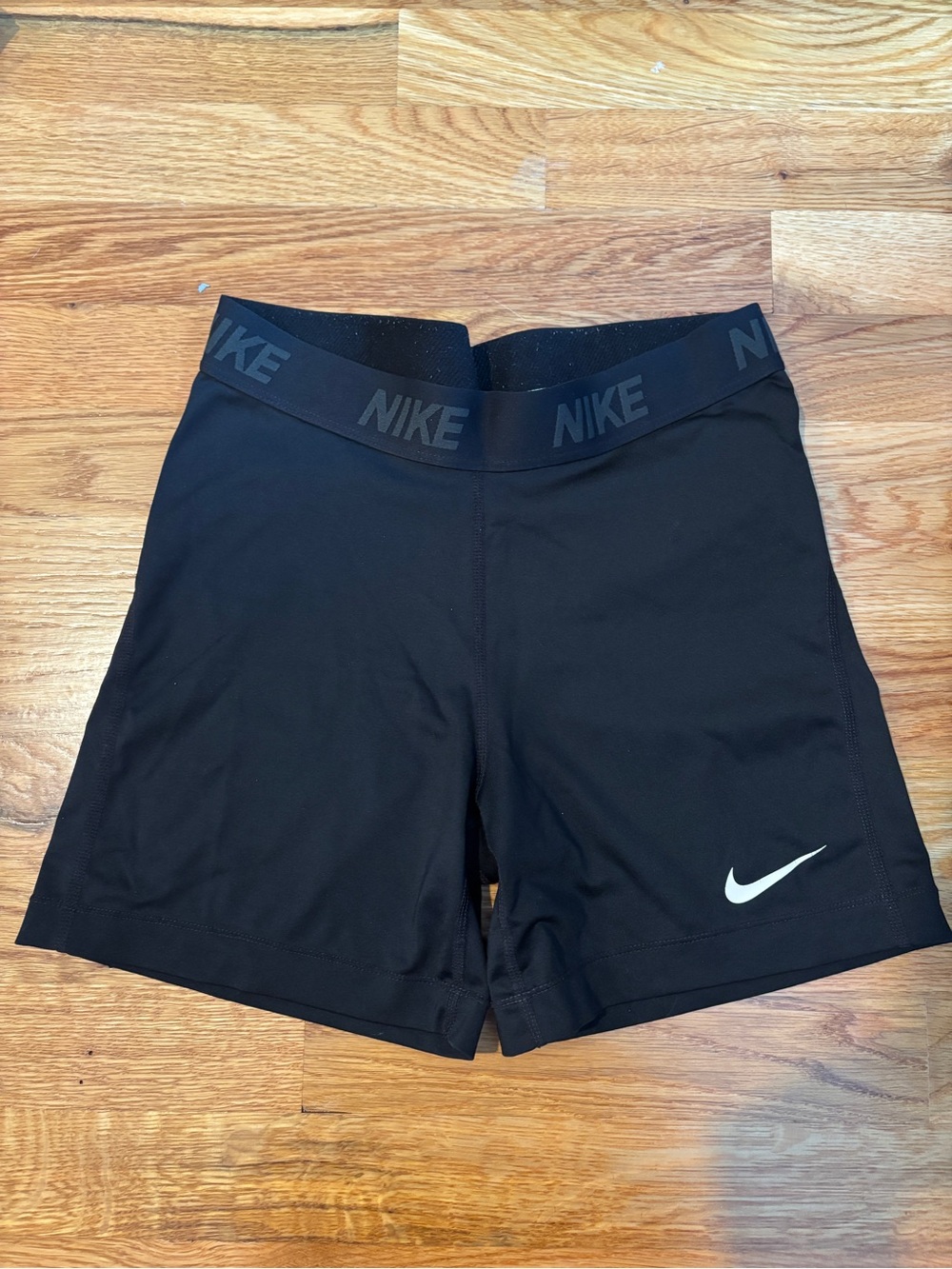 Nike Black Women's Athletic Training Shorts with White Swoosh